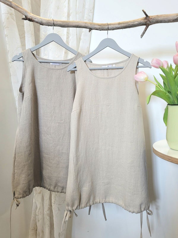 &Auml;rml&ouml;s beige linnetopp, h&auml;rlig naturelf&auml;rg ljus och m&ouml;rk.